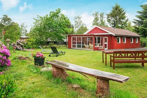 This cottage with whirlpool is located on a quiet road in Arrild Ferieby. The well-equipped kitchen from 2013 is in open connection with the cozy living room, where the wood stove provides heat during the cold periods. There are two bedrooms with goo...