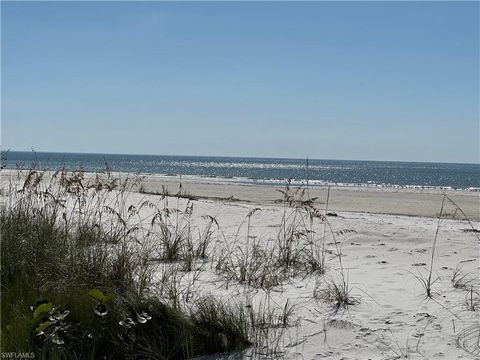 The previous home was washed away by hurricane Ian. This is a perfect opportunity to purchase a beachfront property on the Gulf of Mexico and build your own dream home. Walk out to the white sand beach and watch the best sunsets that SWFL has to offe...
