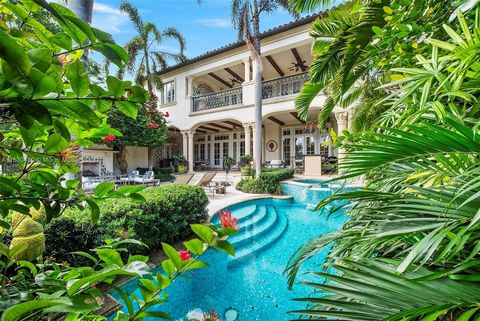 Welcome to your luxurious retreat inside of ultra exclusive Valencia Estates, where Parisian-inspired charm meets Fisher island living at its finest! This stunning estate is a masterpiece of design, boasting impeccable finishes and unrivaled sophisti...