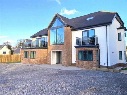 An architecturally designed, executive, luxury and energy efficient family home, with seven double bedrooms, six showers and two baths. It boasts a living room, study, spacious kitchen/breakfast/family room, utility, plant room and cloakroom. In addi...
