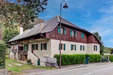 New in SEVRIER 2 steps from the center! Semi-detached stone building built in the 18th century developing 400m2 of useful space and comprising on the one hand, a house for residential use of about 240m2 composed of 4 bedrooms, 2 bathrooms and 109m2 o...