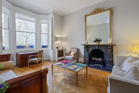 Luxurious Living Across Two Levels in a Historic Georgian Townhouse Welcome to a residence of unparalleled charm and sophistication, spanning two meticulously designed floors within a distinguished Georgian townhouse, masterfully constructed by the r...