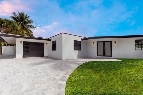 Mid Century Modern style home, beautifully remodeled with a cool coastal vibe. Everything is new! A year in the making, this home has been carefully renovated using the finest designer fixtures. Chef's kitchen with a huge island, double ovens, plus a...