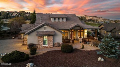 Experience the epitome of luxury living in this Carrington home nestled within the gated Estates at Prescott Lakes set on a generous .64-acre homesite. Meticulously detailed with stunning upgrades, this property offers not only luxurious living but a...