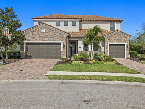 Capture the beauty of this absolutely stunning, one-of-a-kind residence in the gated community of Bridgewater in Lakewood Ranch. This exceptional fully-upgraded home offers 6 bedrooms 4.5 bathrooms, 2 separate garages, and all of the features needed ...