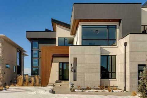 Luxurious, fully loaded walkout with nearly 7, 400 sq ft backing onto the ridge with unobstructed mountain views from every level. Architecturally stunning the curb appeal is highlighted by a 5 car garage and solid wood timber accents. Inside this ar...