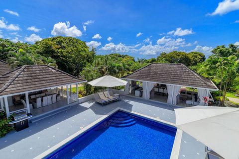 Located in St. James. Tradewinds, a striking five bedroom mansion within the prestigious Sandy Lane Estate. Spacious, luxurious and private, an ideal getaway for a group of friends or family. The immaculate interior-designed living space features din...