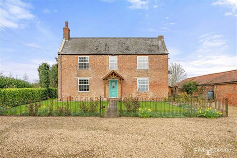 The house itself offers three double bedrooms, one en suite, a family bathroom, two reception rooms, a spacious kitchen, utility room and sizeable, half-glazed boot room, entrance hall and small cellar. Whether to run as a smallholding, an equestrian...