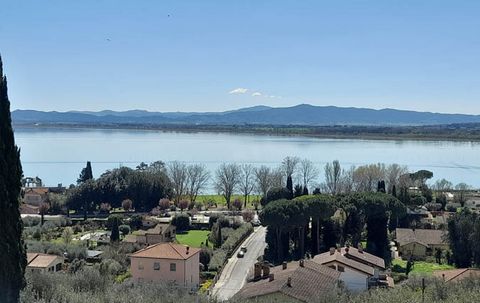 Introduction Discover this charming lakeside townhouse nestled in the picturesque village of Borghetto, just a stone's throw away from the tranquil waters of Lake Trasimeno. With breathtaking views of the shimmering lake and rolling hills, this three...