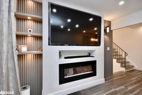 Fall in Love with this Modern & Beauty Home in Barrie. 4 Bedrooms & 2 full Bathrooms perfect for your Family's needs. The Living Room & Family Room are equipped with cozy Fireplaces, the Rec-Room adds convenient Living Space. Located 2 minutes away f...