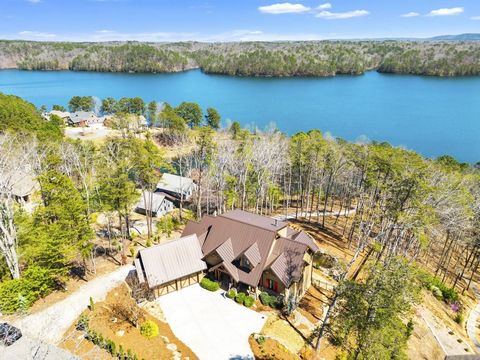Welcome to this magnificent lakeside retreat located on Lake Arrowhead in charming Waleska, GA. Crafted with unparalleled attention to detail built in 2016. Boasting an enviable position with 175 feet of water frontage and perched on 2.14 acres, this...