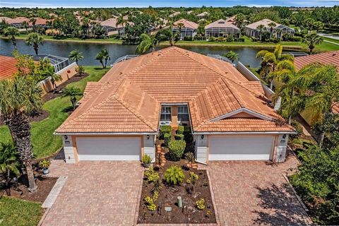 PRIVATE POOL AND WATERVIEWS~TURNKEY OPTIONAL~MOVE IN READY~ IMMACULATELY MAINTAINED~WELLEN PARK, ISLANDWALK The charming residence at 13174 Huerta St in Venice, FL, is a gem waiting to be discovered by a discerning buyer who appreciates both style an...