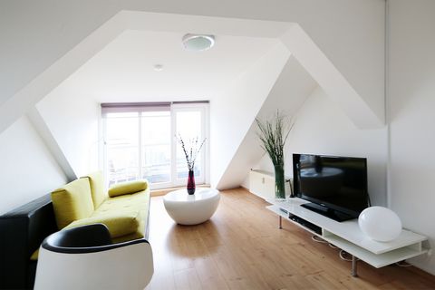 The apartment is stylishly furnished with a modern touch of Scandinavian design. The dinning room is spacious and open to the fully equipped kitchen. You have two separate rooms, one bedroom and one living room. The living room has a comfortable slee...