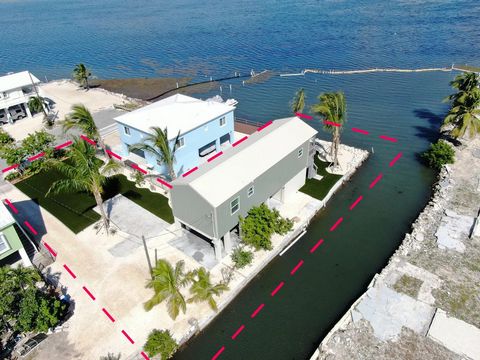 The Adventurer's Retreat - Big Pine Key Bungalow is your home away from home where you can relax & enjoy the centralized location to all the best adventures the Florida Keys have to offer. All rooms have an ocean &/or canal view! The Big Pine Key Bun...