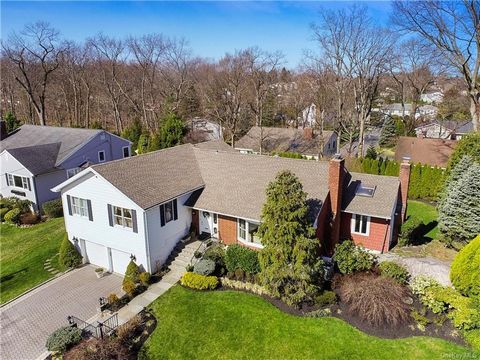 Located in Eastchester's premier California Ridge neighborhood, this immaculate split-level home having only two owners is stone's throw to Lake Isle Country Club with Golf, Tennis, Pools and so much more. From the sweeping yard to its expansive inte...