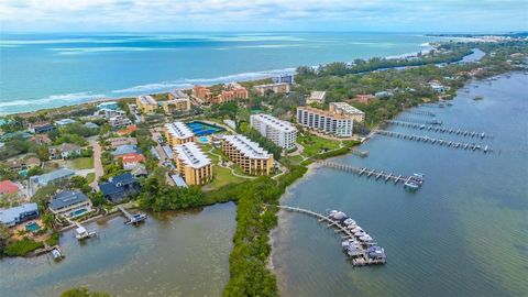 LANAI PARTIAL WATERVIEW, GROUND FLOOR CONDO with option to purchase the boat lift. Welcome to ISLAND REEF where beach, boats, and resort amenities abound!! Those who live here call it PARADISE and Boaters call it a dream come true. Whether you are lo...