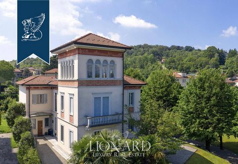 This lovely luxury estate for sale is girdled by nature in close vicinity to Azzate's town centre, in the province of Varese. This property has been finely refurbished and kept its original architectural traits and finishes such as sophisticated...