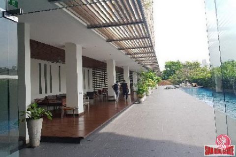 This is a large fully furnished two bedroom, two bath apartment for sale in The Loft Yenakart. The apartment is situated on the 6th floor and is 67.97 sqm. The unit has nice big windows throughout giving the apartment a clean and sunny atmosphere. Th...