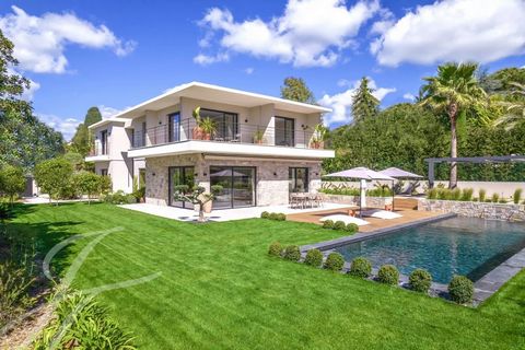 In a private and prestigious estate, this sumptuous contemporary new villa stands at the heart of a meticulously landscaped and richly planted garden. On the ground floor, a majestic entrance reveals a spacious living area of approximately 100 m², ba...