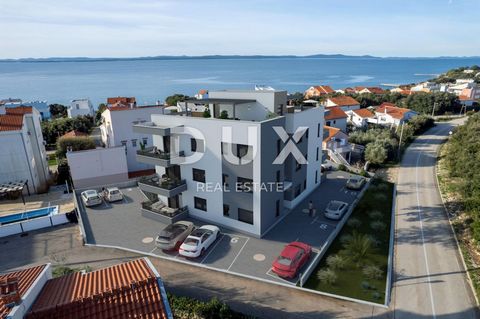 Location: Zadarska županija, Zadar - Okolica, Petrčane. ZADAR, PETRČANE - Spacious apartment with a garden under construction 150 m from the sea An apartment with a garden under construction is for sale in Petrčane near Zadar. The apartment with a to...