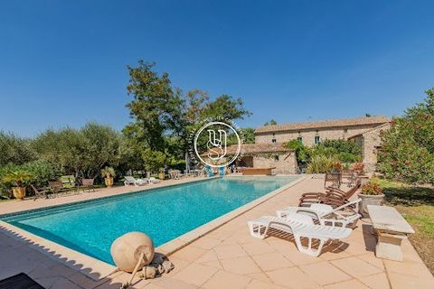 Located in a pretty, quiet village ten minutes from Uzès, this beautifully renovated country house sits on land of approximately 7000 m². The property consists of over 300m2 of living space with several outbuildings and stables. On the ground floor, ...