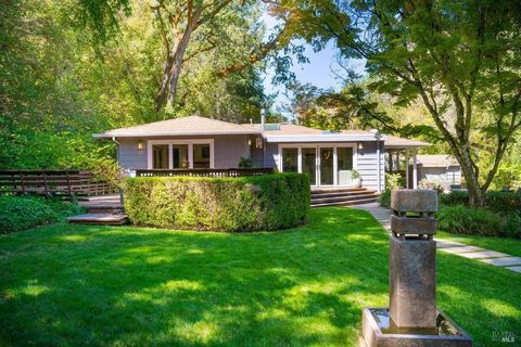 Tucked beside a peaceful, year-round creek, the home is perfect for luxurious full-time living or indulgent weekend getaways. This extraordinary 20-acre estate is just a short 8-minute drive from the lively downtown St. Helena, and all its world-clas...