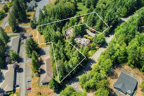 Nestled in the picturesque locale of Port Ludlow, Washington, this exceptional 1.13 acre lot presents an unmatched opportunity for savvy investors seeking to capitalize on the booming real estate market. With architecture/engineering plans for a six-...