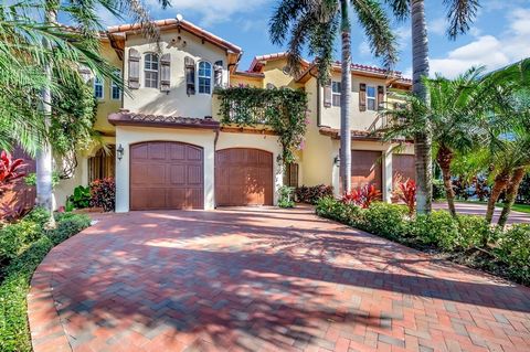 Experience a beach lifestyle in this two-story glamorous townhouse completely updated with hurricane windows and doors, one block from vibrant Atlantic Avenue and 2 blocks from the beach. Enter this beautiful 4 bedroom + one bonus room, and 3 full ba...