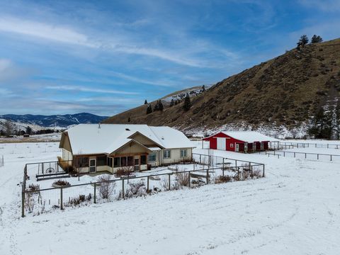 Attention outdoor enthusiasts, animal lovers, & gardeners! This 3-acre property features a 2800 sqft home, built in 2018, with 3 bedrooms + an office, 2.5 baths, attached 3-bay garage with workshop, & a 3-stall barn. Amenities include: gas fireplace ...