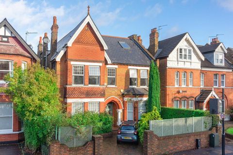 Situated on Madeley Road, this commanding detached period property presents an exquisite blend of opulent living, sprawling across four floors, and a notably spacious garden enveloped in serene privacy. The allure of this exceptional residence, adorn...