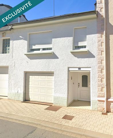 Maison de ville avec 4 chambres, garage et jardin à Volmerange!