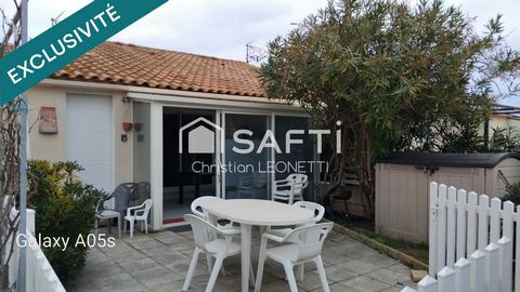 maison en bord de la lagune avec une belle terrasse