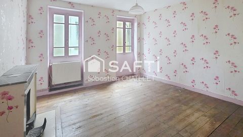 Maison de ville à rénover avec beau potentiel