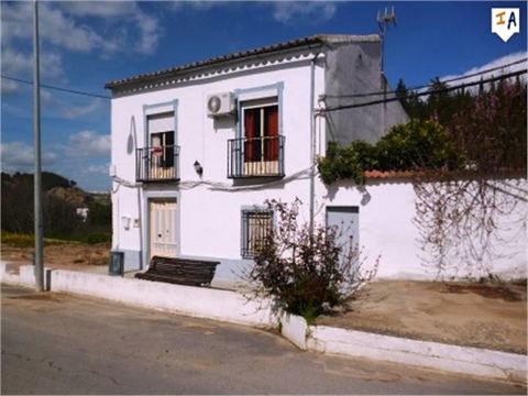 This deceptively large 5 Bedroom town house is located in the pretty village of El Tejar close to amenities and a short drive from the larger town of Benameji, in the Cordoba province of Andalucia, Spain. Downstairs you will find the lounge which lea...