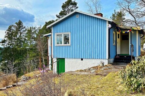 High up on the mountain, this small cozy house sits, very secluded with glimmers of sea between the trees. Down across the road is your own jetty, cozy to take a morning dip or bring your picnic basket and end the day at sunset. The house is simple b...