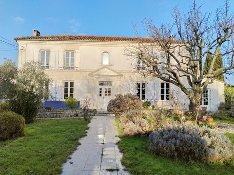 Discover this charming stone character property just 15 minutes from Cognac, nestled in a peaceful and serene setting. Surrounded by an enclosed wooded park, this home offers spacious accommodation and a welcoming atmosphere from the moment you step ...