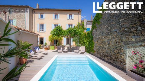 A26892AGU11 - Discover the allure of a historic Maison de Maître in Rieux Minervois, Southern France. This three-story masterpiece, boasting elegant stone walls and preserved original features, invites you into a world of enchantment. With high ceili...