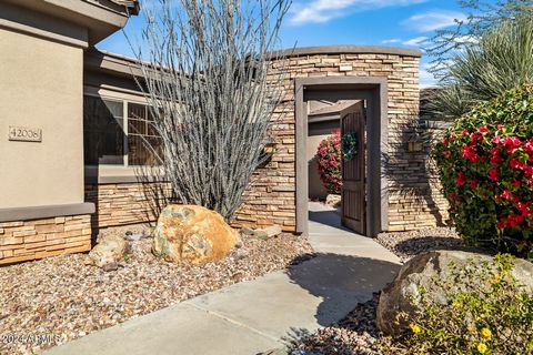 This delightful home features a guest casita with a full bathroom and private entrance. Enjoy a serene front courtyard with a soothing water fountain. Inside, the home boasts neutral colors throughout complemented by18-inch diagonal tile and textured...
