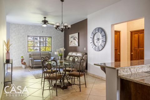 Welcome to this charming, fully furnished apartment situated in Valle Escondido. Upon entering, you'll be greeted by a welcoming foyer adorned with a slim wooden console table and a mirror. Moving forward, you'll discover an open-concept space seamle...