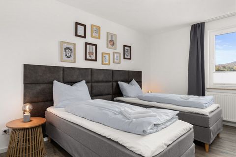 The 60m² apartment is equipped with four comfortable 90cm box-spring beds - spread over two bedrooms. The beds can also be pushed together to form a 1.80m double bed. You will also find a 4K smart TV and fast WiFi. You can park for free and check in ...