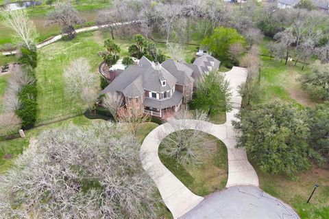 VERY RARE FIND...Tranquil Executive Estate nestled on 2.66 beautiful fully fenced acres in highly sought after Prestigious Rolling Oaks community! Exterior boasts mature trees, large pool/spa surrounded by travertine decking, Generac whole house gene...