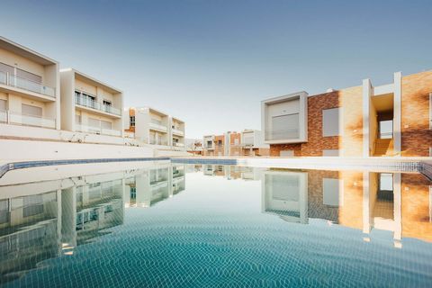 Bela Baía ligt aan het strand van Salir do Porto en is een gemeenschap van moderne appartementen gebouwd rond een 