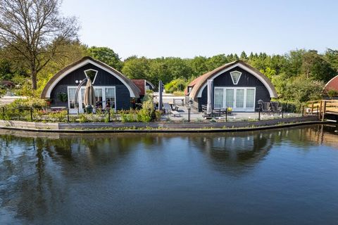 This modern holiday home is located in a small-scale holiday park, in the middle of the forest. Due to the shape of the partly thatched roof, this accommodation has a special appearance, both outside and inside. The holiday home is suitable for up to...