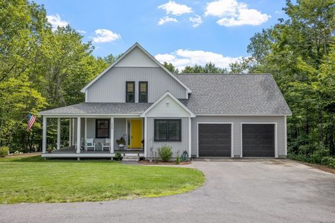 Beautifully finished custom built home situated on 12 acres in Wolfeboro. No details were left behind with this 4 bedroom 2 and half bathroom home. Exterior is accented with board and batten siding, black windows, large back deck perfect for entertai...
