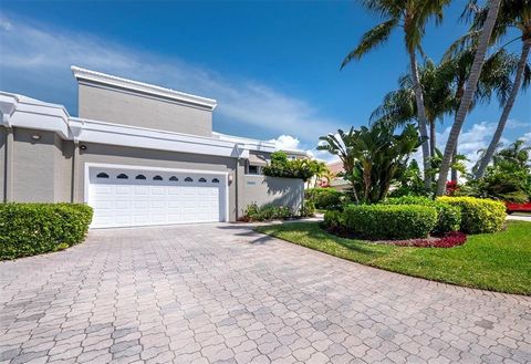 Experience the ultimate waterfront lifestyle in Corey's Landing, an intimate and esteemed community nestled on Sarasota Bay and behind the gates of coveted Bay Isles, where every day feels like a retreat in paradise. As you take the paver walkway and...