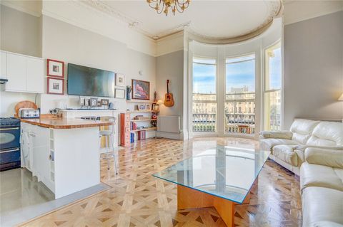 Just up from Hove promenade with spectacular views to the north and south across the Square’s gardens, the maisonette sits in the centre of the eastern terrace with sea views from the large first floor windows and balcony and an outlook directly over...