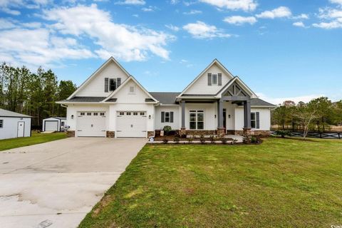 Introducing a truly exceptional property situated on 1.3 acres of picturesque lakefront property. This rare find boasts a spacious 4 bedroom, 3 bath layout spanning over 2600 heated square feet, making it the perfect blend of luxury and comfort. Step...