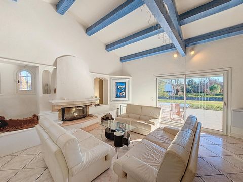 Here is the English translation of your text: In a quiet area, close to shops, schools, transport, and the motorway access, come and discover this superb villa of 159 m² (151m² Carrez law) set on a flat plot of 2050 m², not overlooked; discreet adjoi...