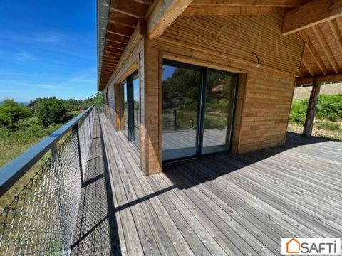For sale, a magnificent new wooden house, on a large plot of 2,147 m2. Top-of-the-range services designed by a renowned architect. 3 spacious bedrooms with natural light and panoramic view over the plain of Roanne and Charlieu. Large terraces to enjo...