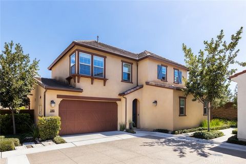 Nestled in the prestigious community of Greenwood at Tustin Legacy, this exceptional single-family home offers a blend of luxury, comfort, and convenience. Boasting upscale features and access to resort-style amenities, this residence provides an unp...